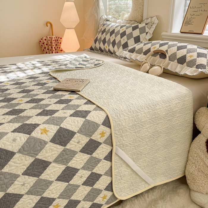 91家纺网 家纺一手货源 找家纺 羽爱家纺 2025新款舒适可定制全棉防滑床盖软席菱形世界