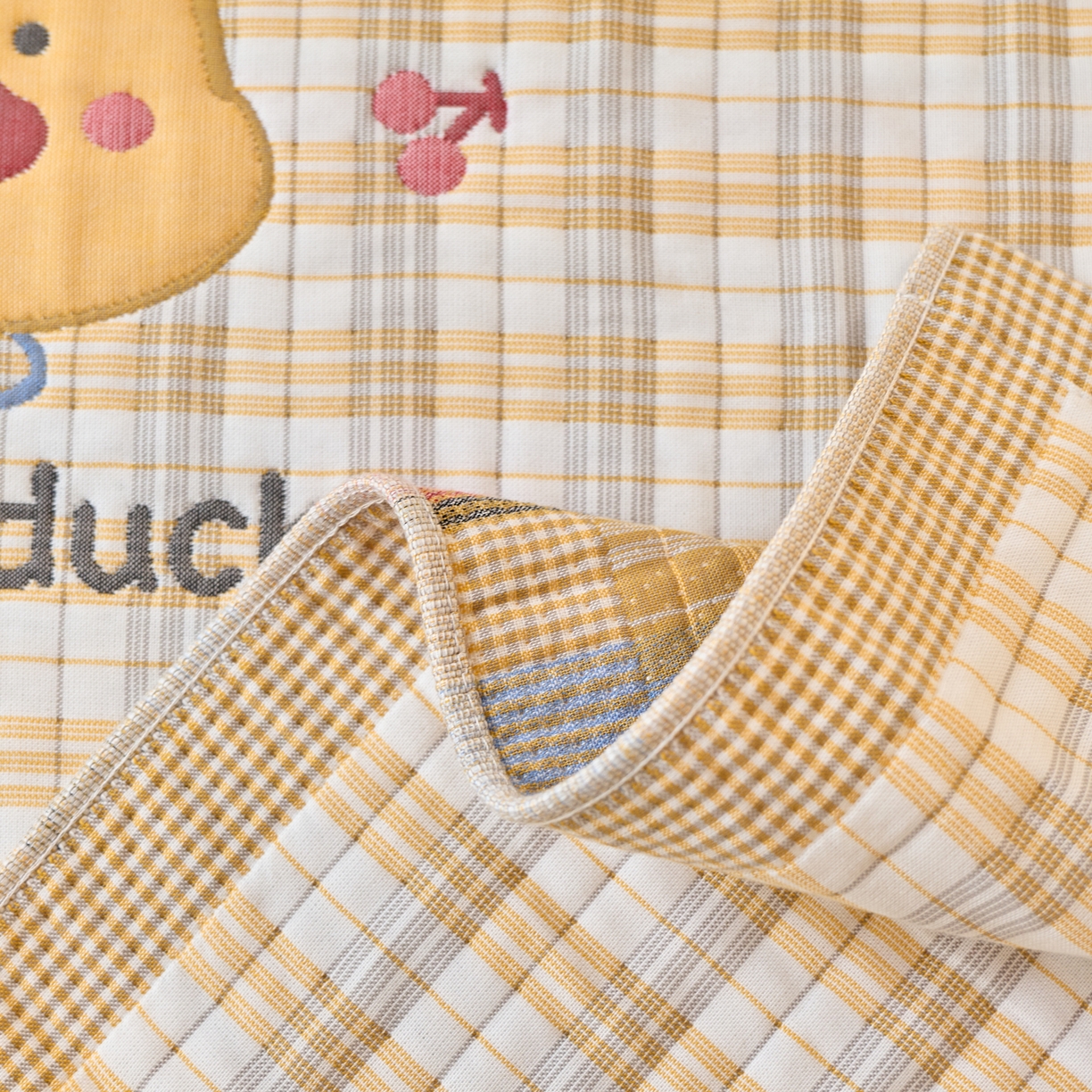 91家纺网 家纺一手货源 找家纺 沐瑟家纺 2025新款卡通格子纯棉八层枕巾（含质检报告） 橙小鸭