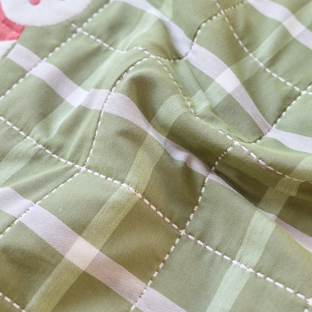 91家纺网 家纺一手货源 找家纺 沐瑟家纺 2025新款卡通格子纯棉八层枕巾（含质检报告） 围巾狗