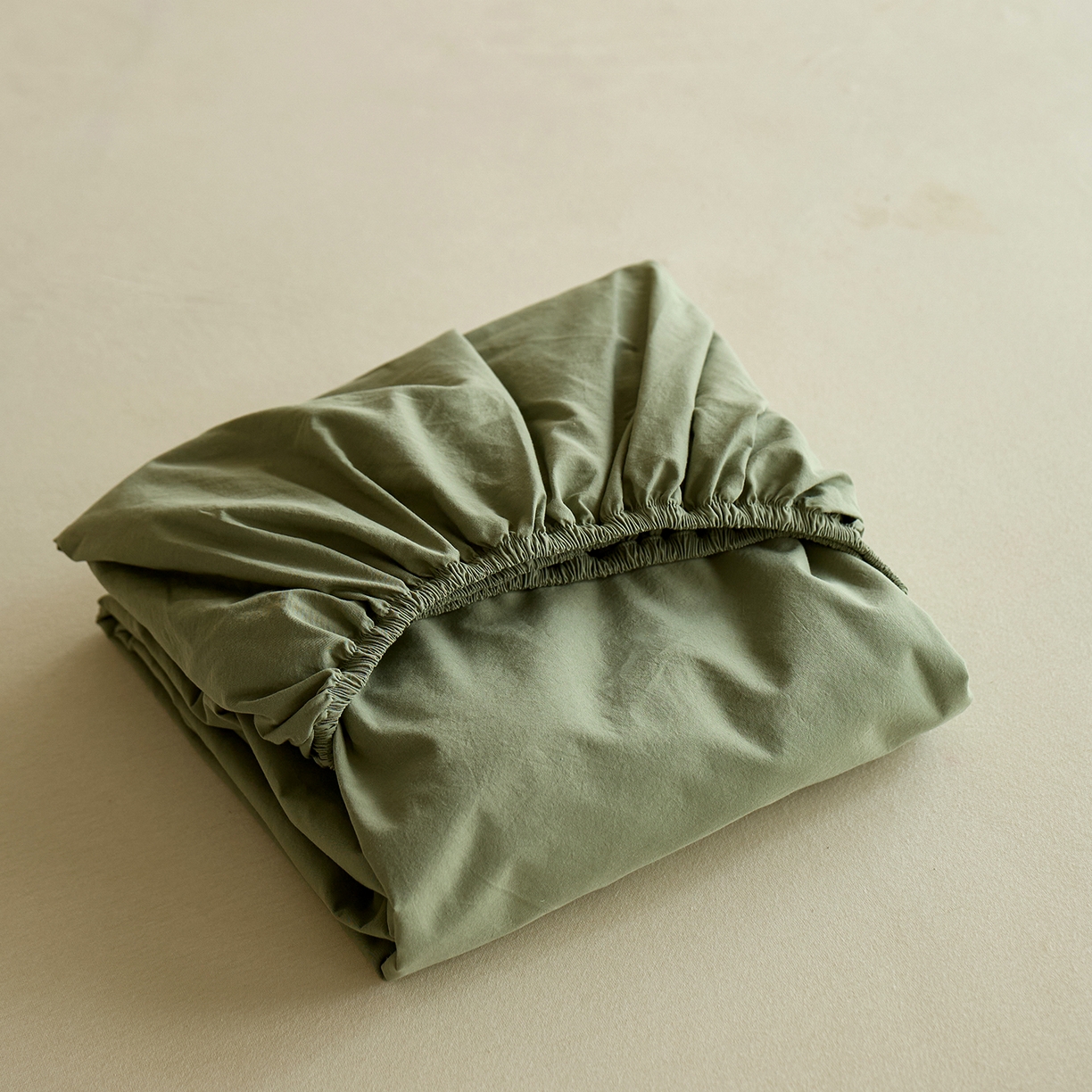 91家纺网 家纺一手货源 找家纺 轩和家居 2025新款全棉高支旧感砂洗长绒棉单床笠 青绿色