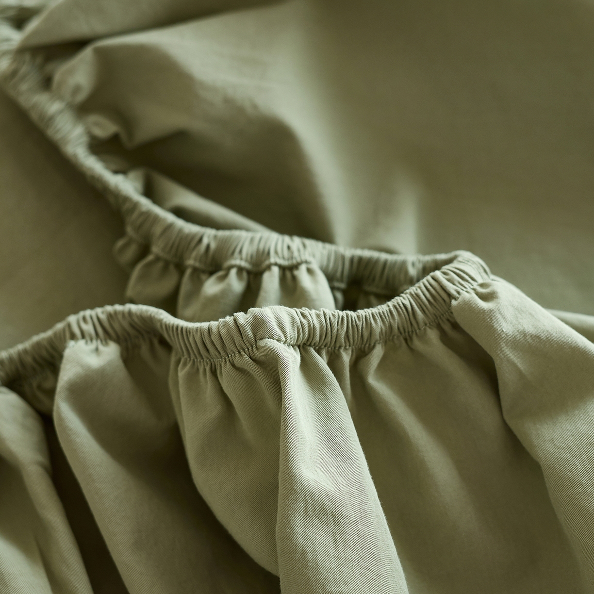 91家纺网 家纺一手货源 找家纺 轩和家居 2025新款全棉高支旧感砂洗长绒棉单床笠 青绿色