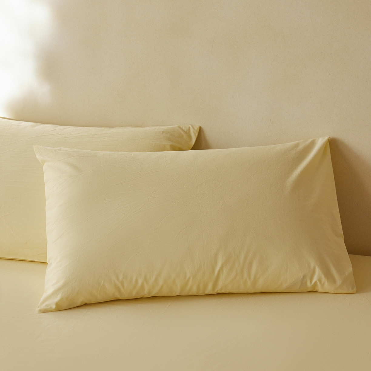 91家纺网 家纺一手货源 找家纺 轩和家居 2025新款全棉高支旧感砂洗长绒棉单枕套 淡黄色