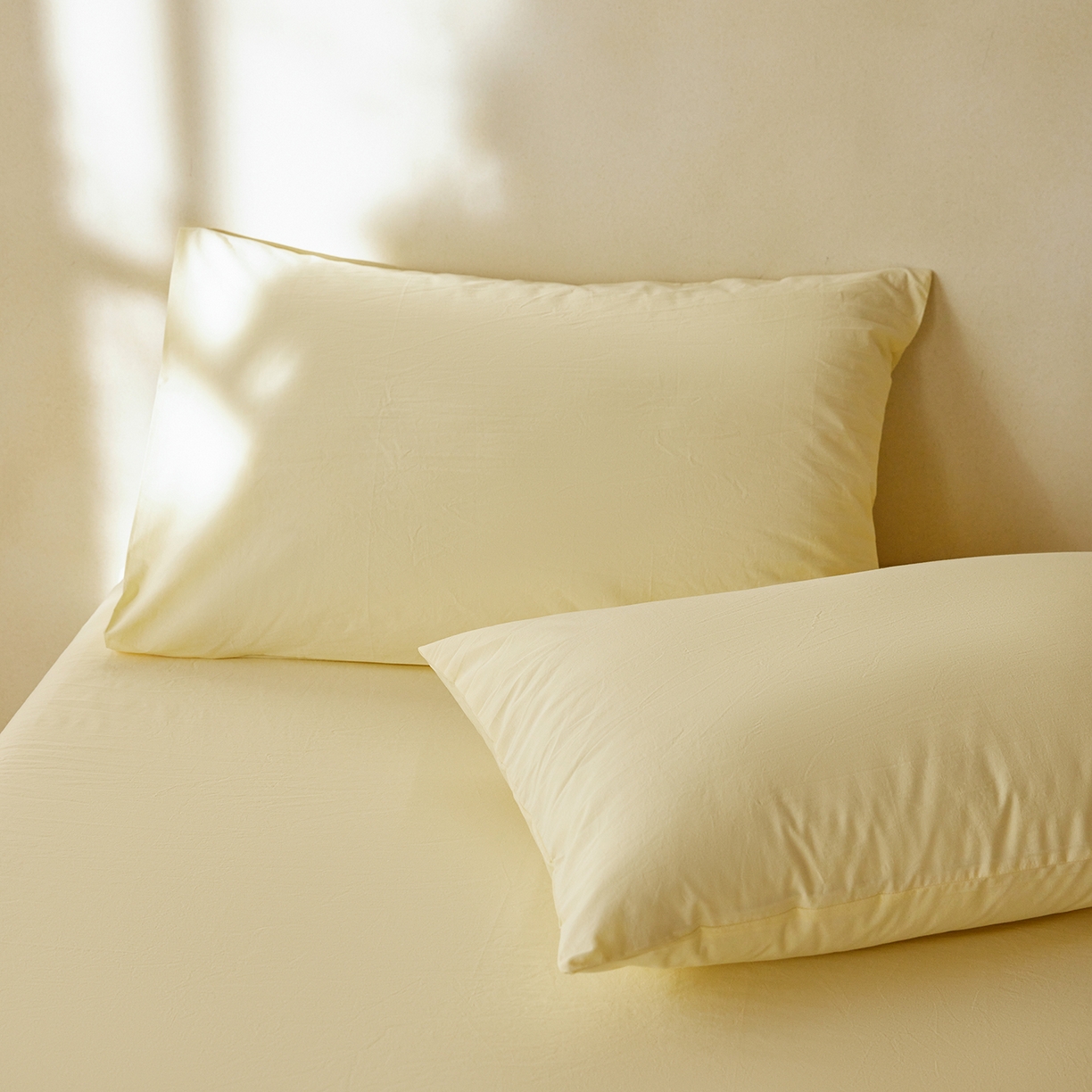 91家纺网 家纺一手货源 找家纺 轩和家居 2025新款全棉高支旧感砂洗长绒棉单枕套 淡黄色