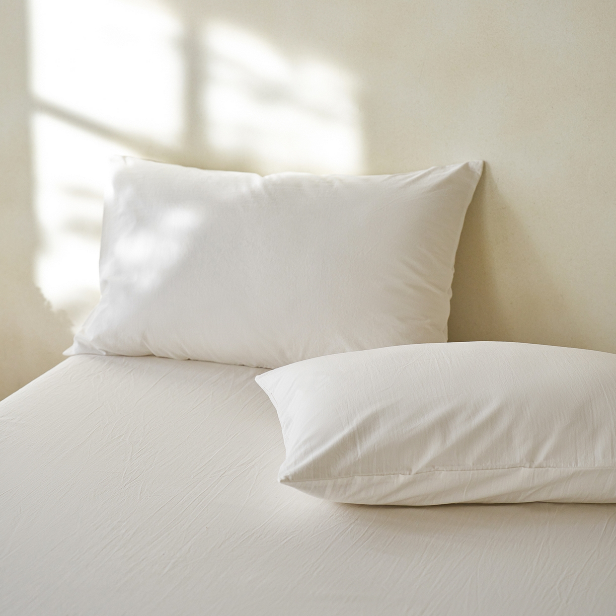 91家纺网 家纺一手货源 找家纺 轩和家居 2025新款全棉高支旧感砂洗长绒棉单枕套 浅云白