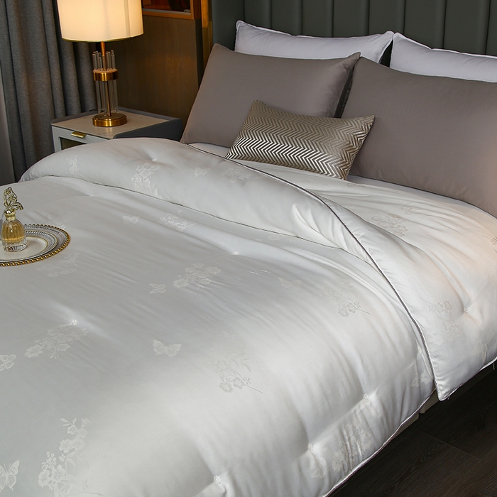 91家纺网 家纺一手货源 找家纺 畅畅家纺 2025新款微商热款蝴蝶丝棉被加厚全棉纯棉莫代尔提花手工订花被子被芯 经典白