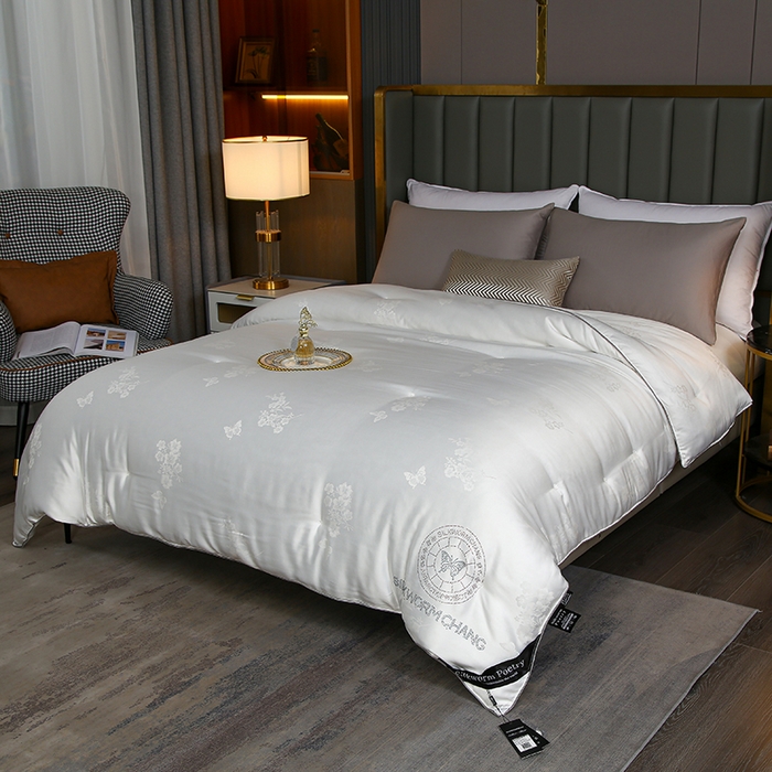 91家纺网 家纺一手货源 找家纺 畅畅家纺 2025新款微商热款蝴蝶丝棉被加厚全棉纯棉莫代尔提花手工订花被子被芯 经典白