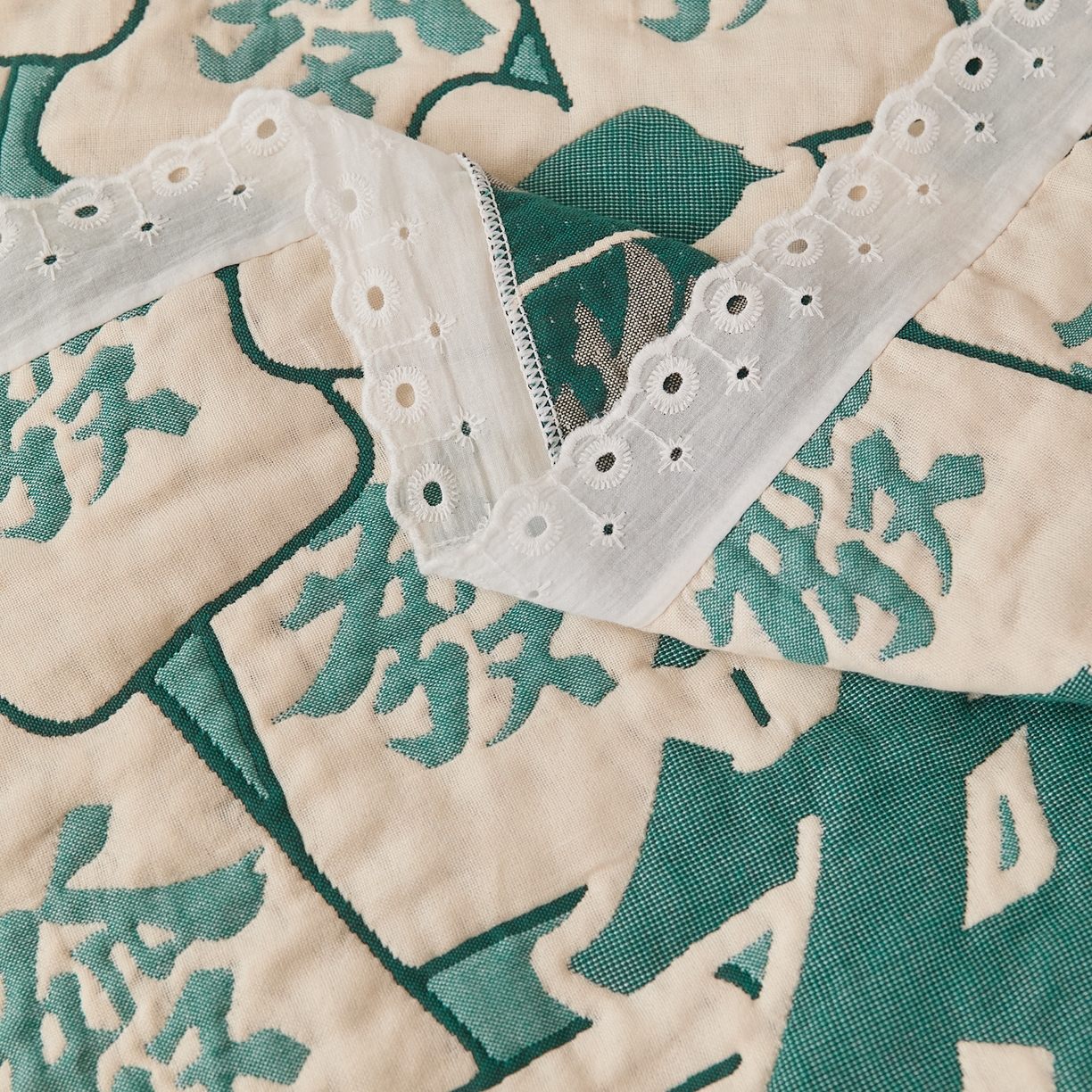 91家纺网 家纺一手货源 找家纺 沐瑟家纺 2025新款花边枕巾 发财-绿