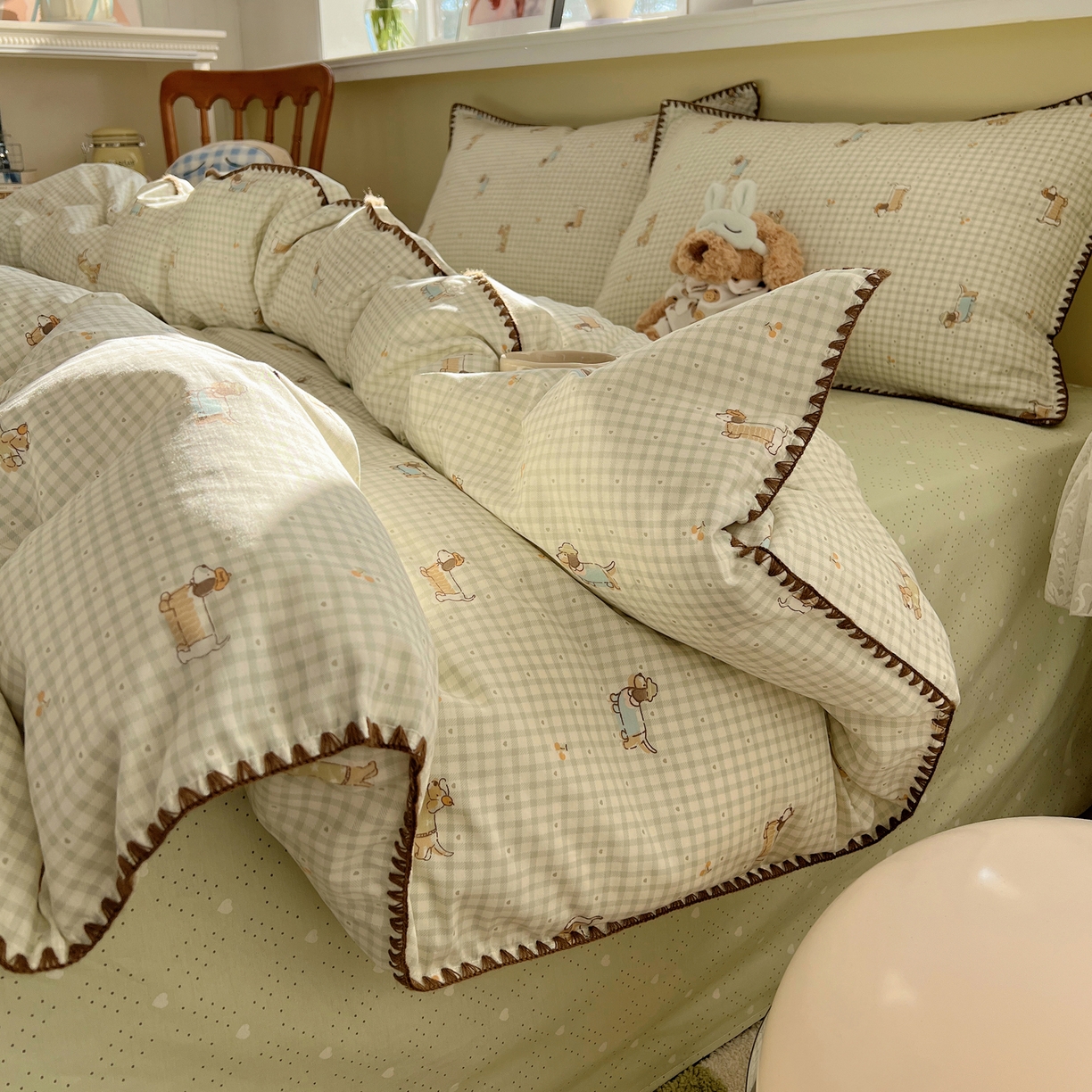 91家纺网 家纺一手货源 找家纺 瑞莱 2026新款全棉印花贝壳边四件套 活泼小狗