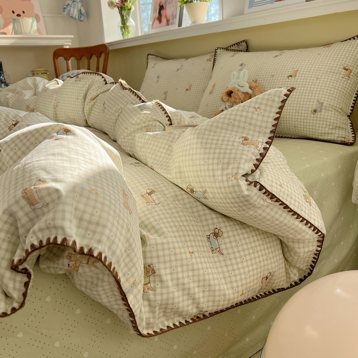 91家纺网 家纺一手货源 找家纺 瑞莱 2026新款全棉印花贝壳边四件套 活泼小狗