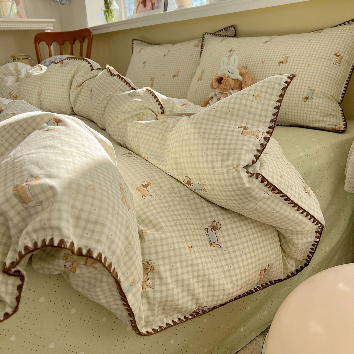 91家纺网 家纺一手货源 找家纺 瑞莱 2026新款全棉印花贝壳边四件套 活泼小狗