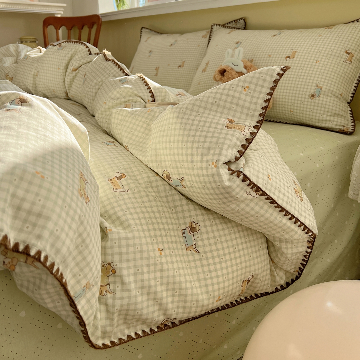 91家纺网 家纺一手货源 找家纺 瑞莱 2026新款全棉印花贝壳边四件套 活泼小狗