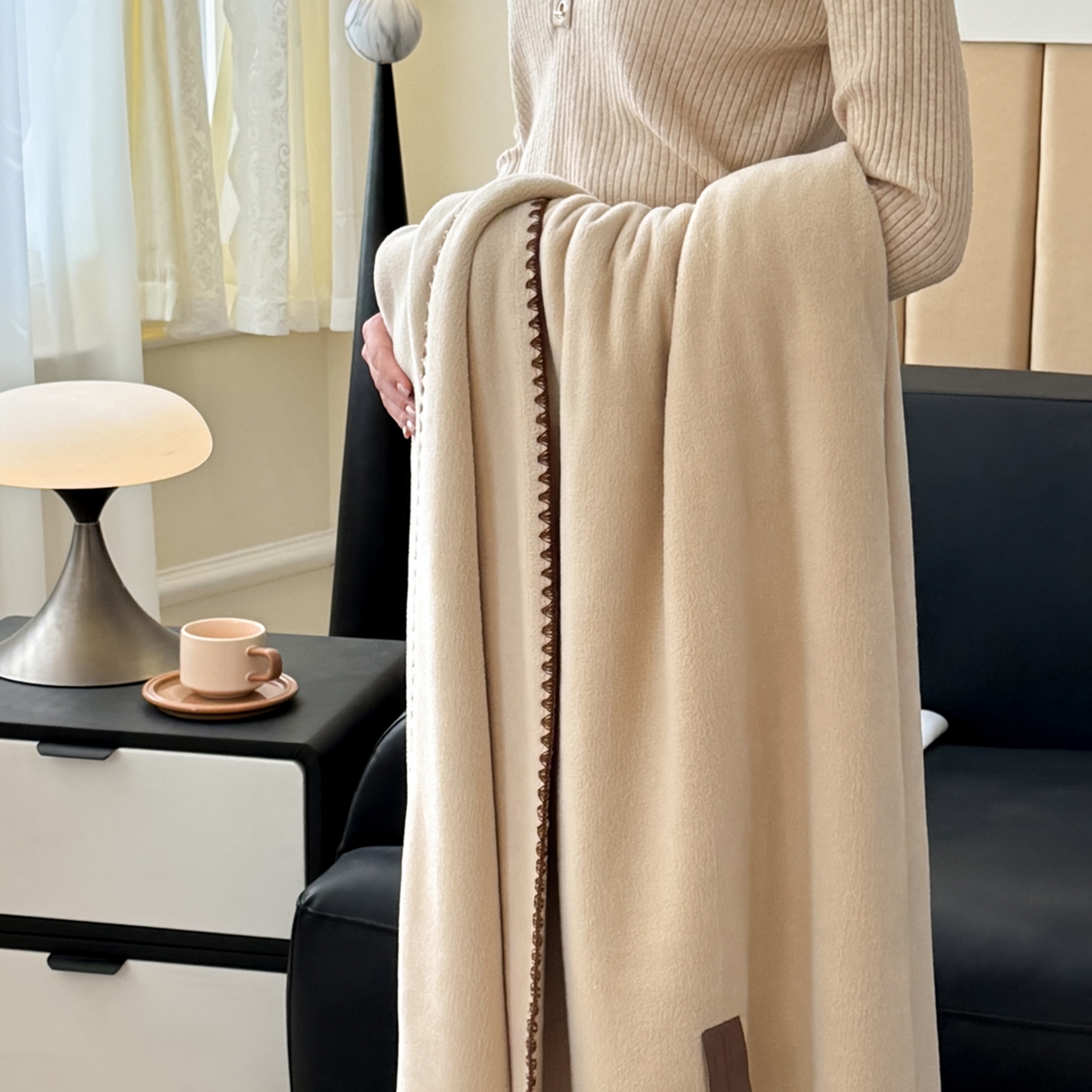 91家纺网 家纺一手货源 找家纺 金喜 2025新款双面仿羊绒多功能毯毛毯盖毯 摩卡