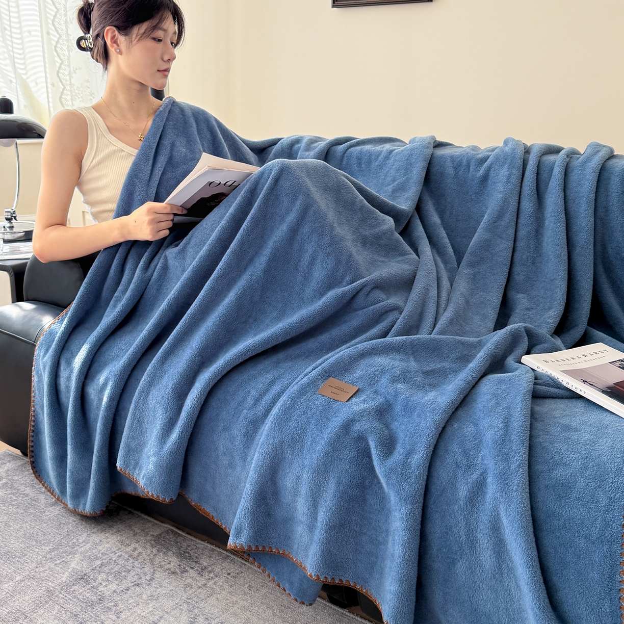 91家纺网 家纺一手货源 找家纺 金喜 2025新款双面仿羊绒多功能毯毛毯盖毯 蓝宝石