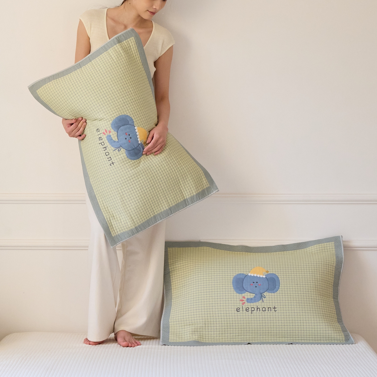 91家纺网 家纺一手货源 找家纺 沐瑟家纺 2026新款全棉纯棉八层枕巾-卡通格子 水滴象 52x78cm枕巾一只