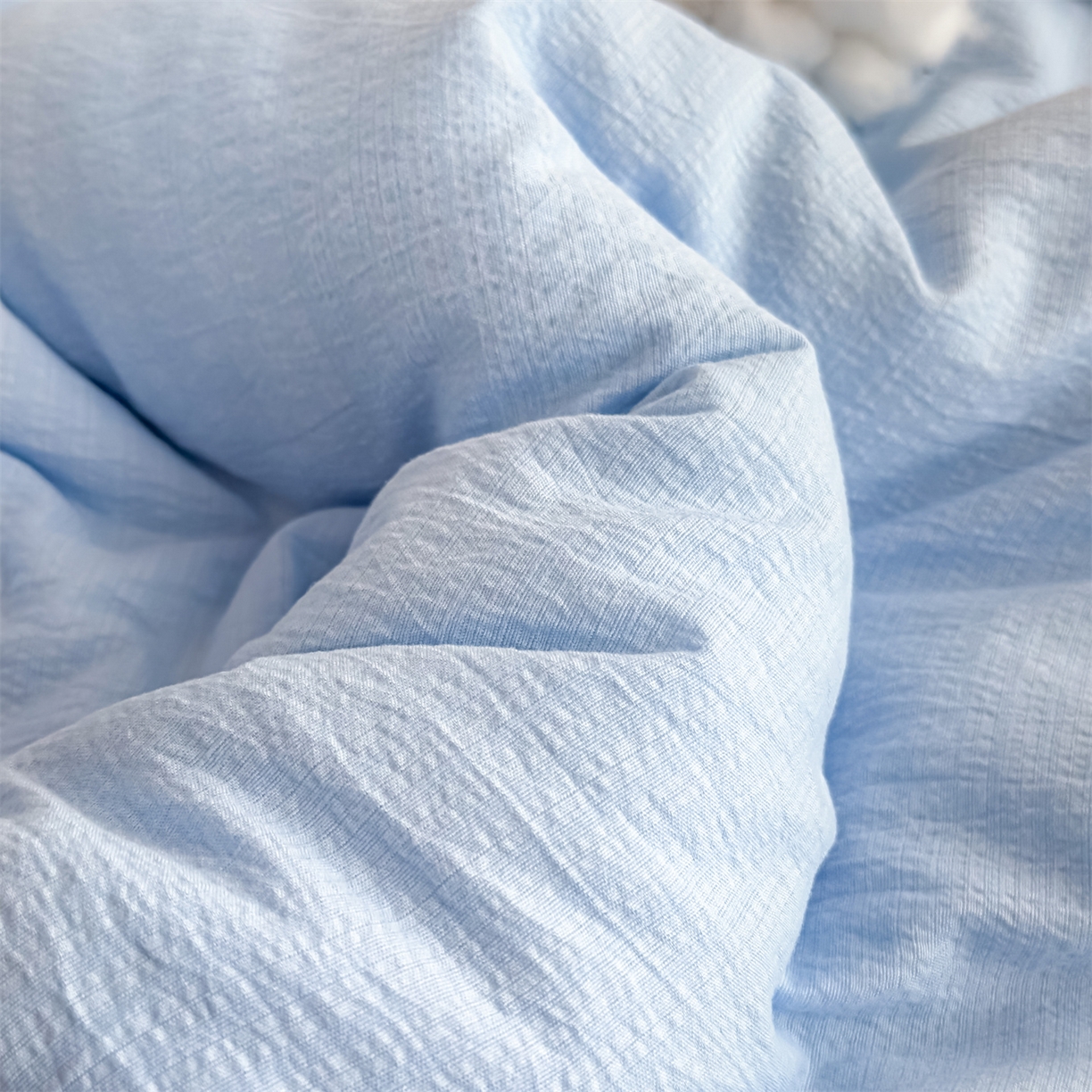 91家纺网 家纺一手货源 找家纺 默忆 2025新款A类木棉皱皱纱棉花被被子被芯 蓝色