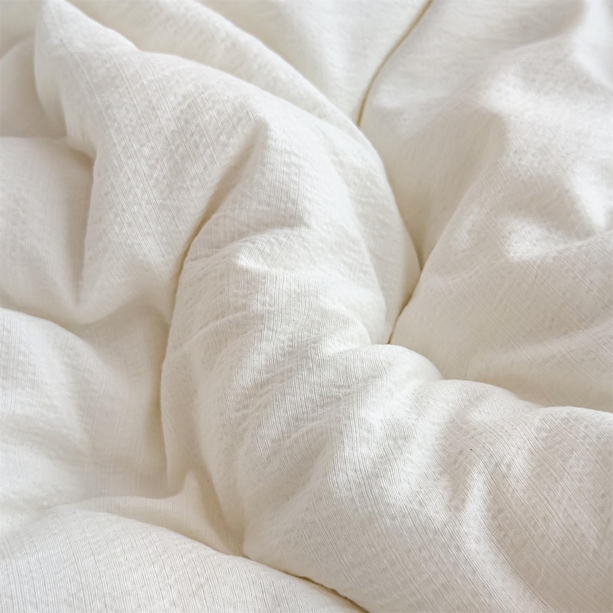 91家纺网 家纺一手货源 找家纺 默忆 2025新款A类木棉皱皱纱棉花被被子被芯 白色