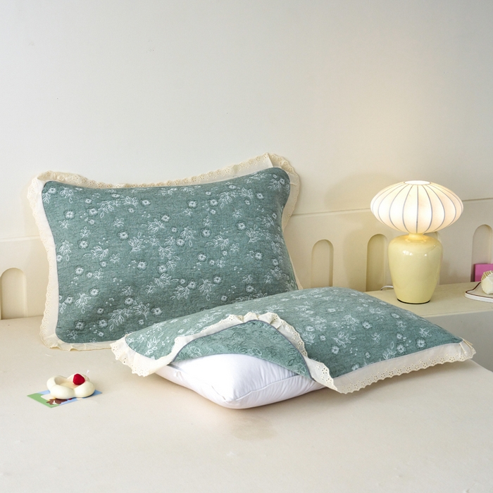 91家纺网 家纺一手货源 找家纺 棠薇家纺 2025新款花边款枕巾提花枕巾 花边春意绿