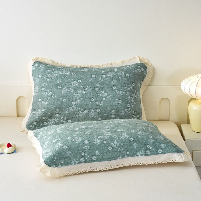 91家纺网 家纺一手货源 找家纺 棠薇家纺 2025新款花边款枕巾提花枕巾 花边春意绿