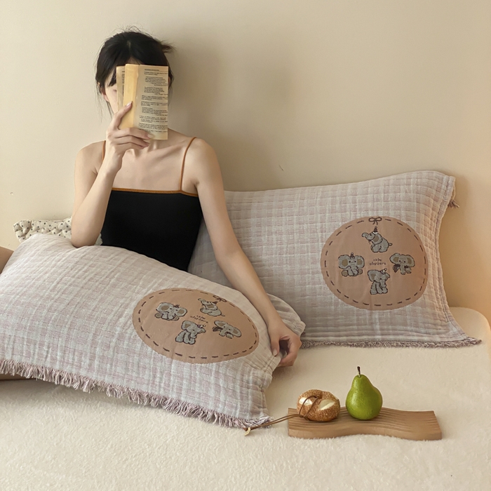 91家纺网 家纺一手货源 找家纺 麻依 2025新款全棉四层纱布软萌流苏枕巾 帽子小象