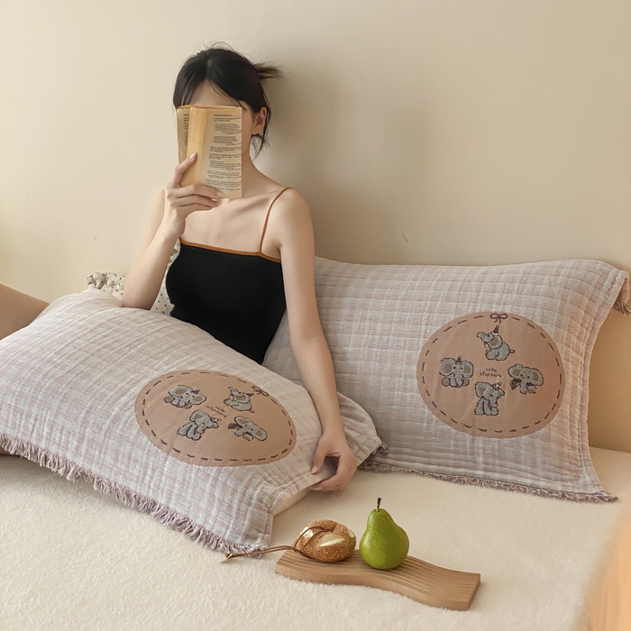 91家纺网 家纺一手货源 找家纺 麻依 2025新款全棉四层纱布软萌流苏枕巾 帽子小象