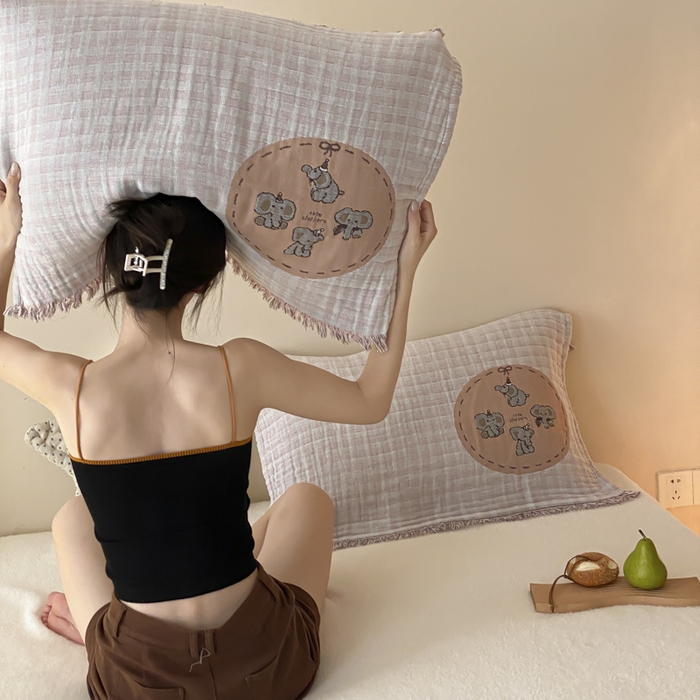 91家纺网 家纺一手货源 找家纺 麻依 2025新款全棉四层纱布软萌流苏枕巾 帽子小象