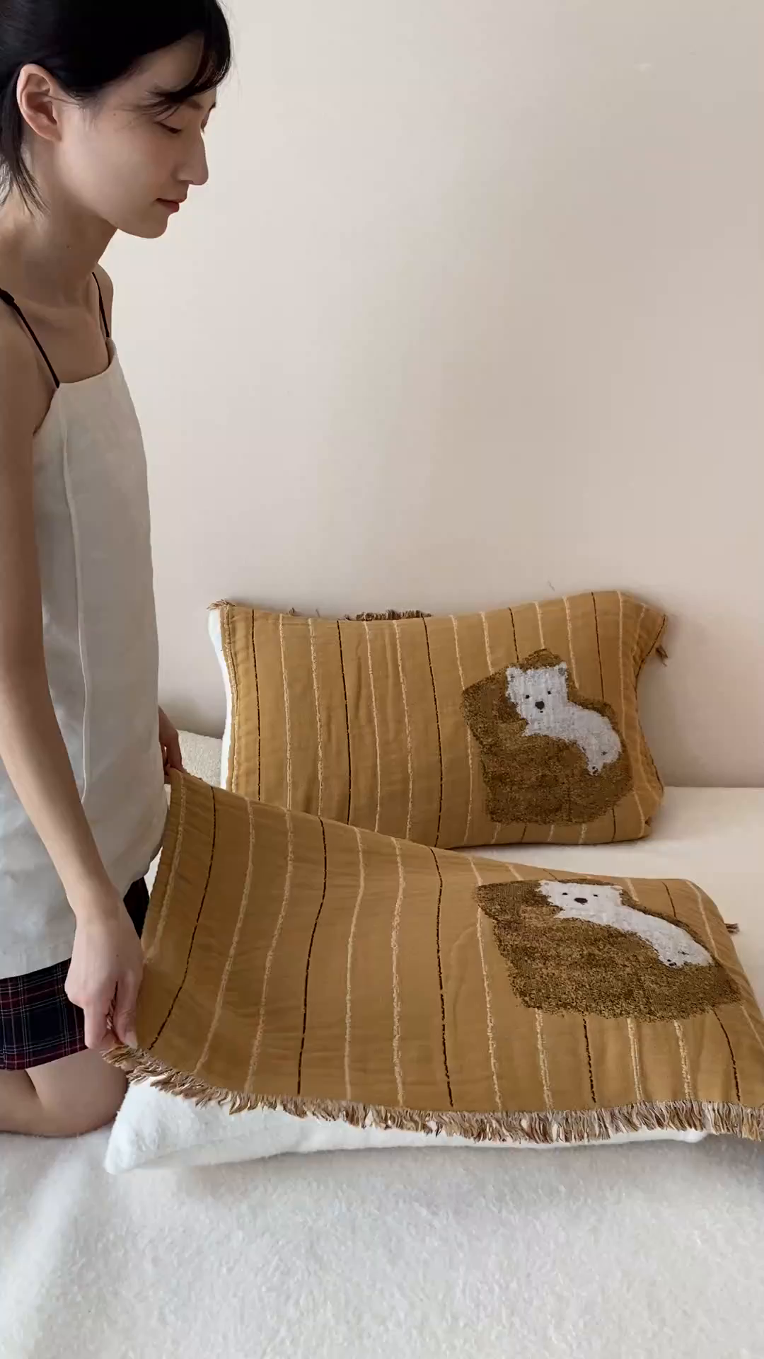 91家纺网 家纺一手货源 找家纺 麻依 2025新款全棉四层纱布软萌流苏枕巾 沙发小狗