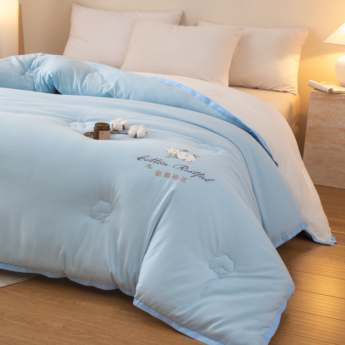 91家纺网 家纺一手货源 找家纺 衿成家纺 2025新款如沐暖阳新疆棉花被子被芯 蓝拼白