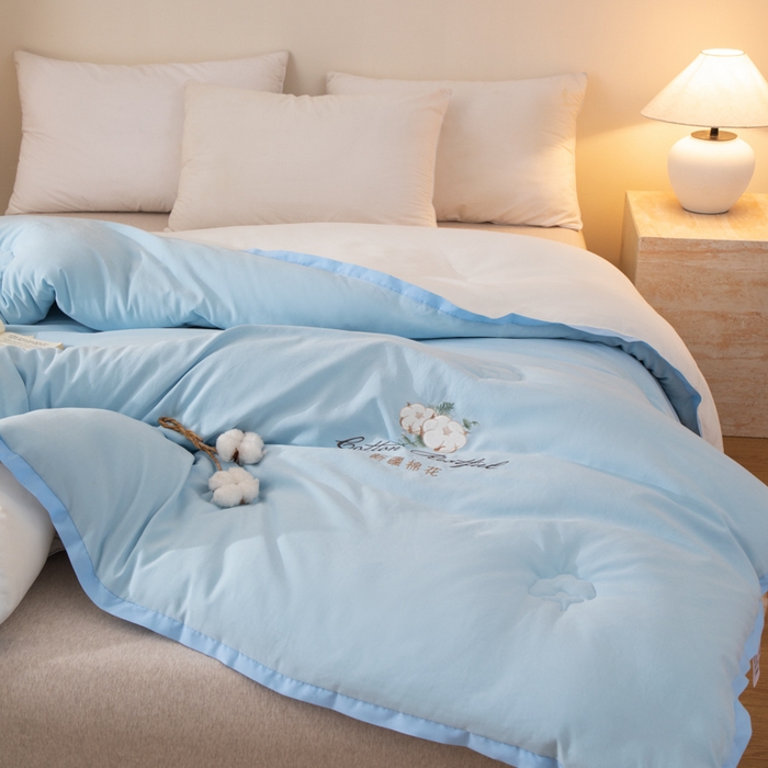 91家纺网 家纺一手货源 找家纺 衿成家纺 2025新款如沐暖阳新疆棉花被子被芯 蓝拼白