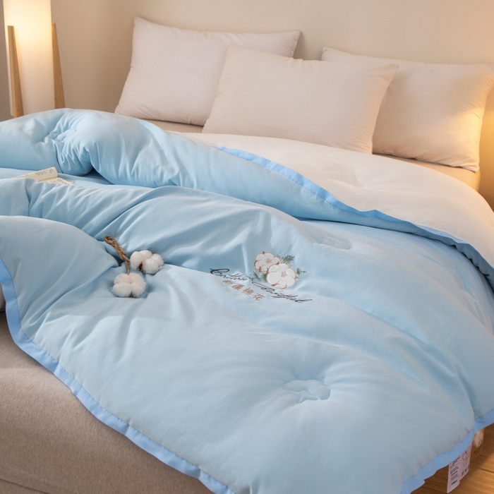 91家纺网 家纺一手货源 找家纺 衿成家纺 2025新款如沐暖阳新疆棉花被子被芯 蓝拼白