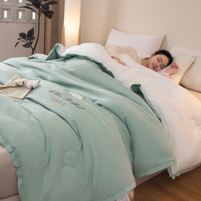 91家纺网 家纺一手货源 找家纺 衿成家纺 2025新款如沐暖阳新疆棉花被子被芯 绿拼白