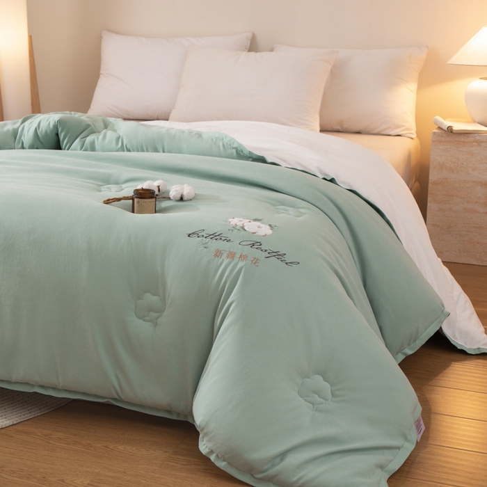 91家纺网 家纺一手货源 找家纺 衿成家纺 2025新款如沐暖阳新疆棉花被子被芯 绿拼白