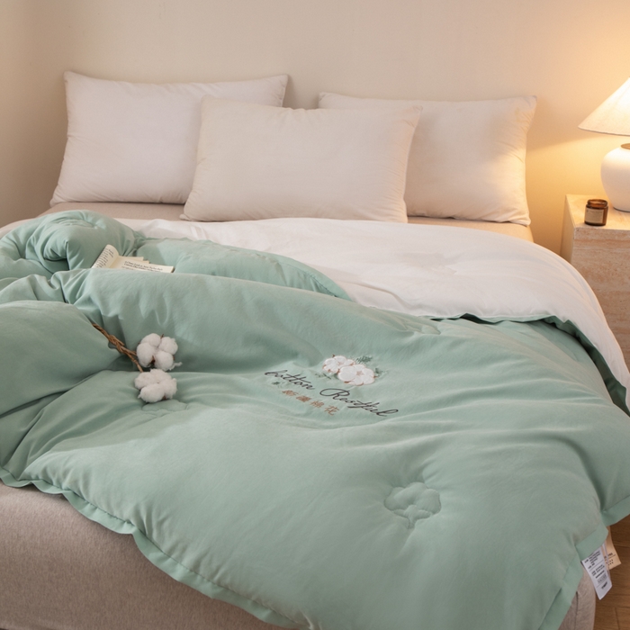 91家纺网 家纺一手货源 找家纺 衿成家纺 2025新款如沐暖阳新疆棉花被子被芯 绿拼白