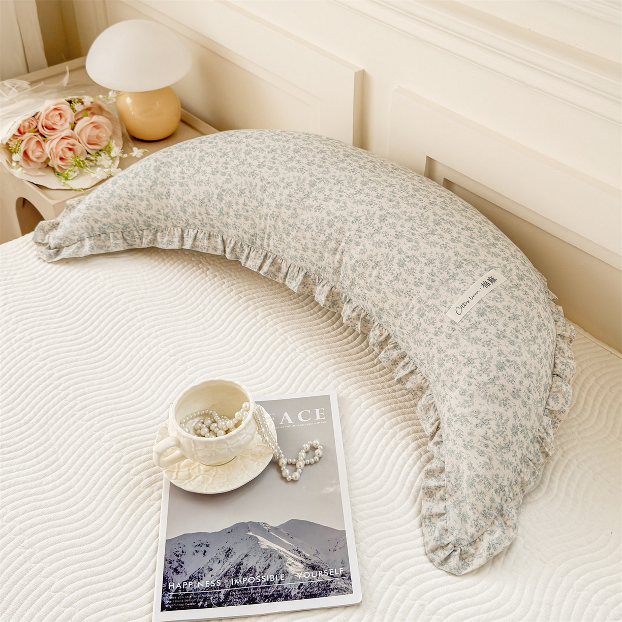 91家纺网 家纺一手货源 找家纺 （总）麦肯锡 2025新款全棉亚麻碎花月牙抱枕夹腿抱枕