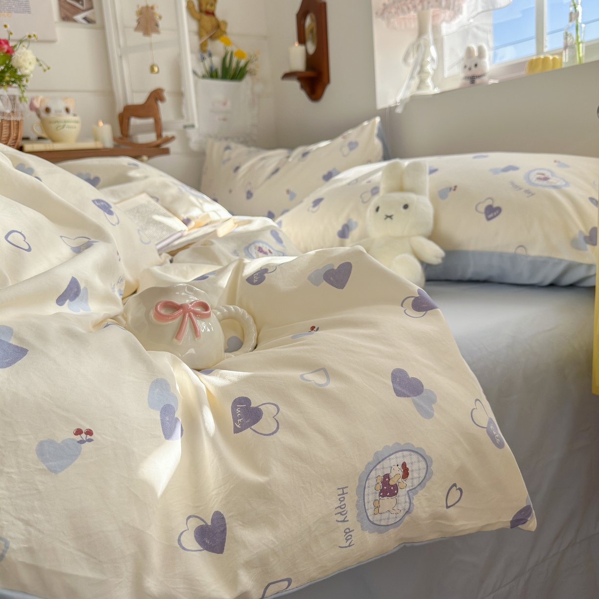 91家纺网 家纺一手货源 找家纺 金梦拉家纺 2026新款春夏古法水洗仿棉砂洗云小棉小布袋四件套 爱心狗