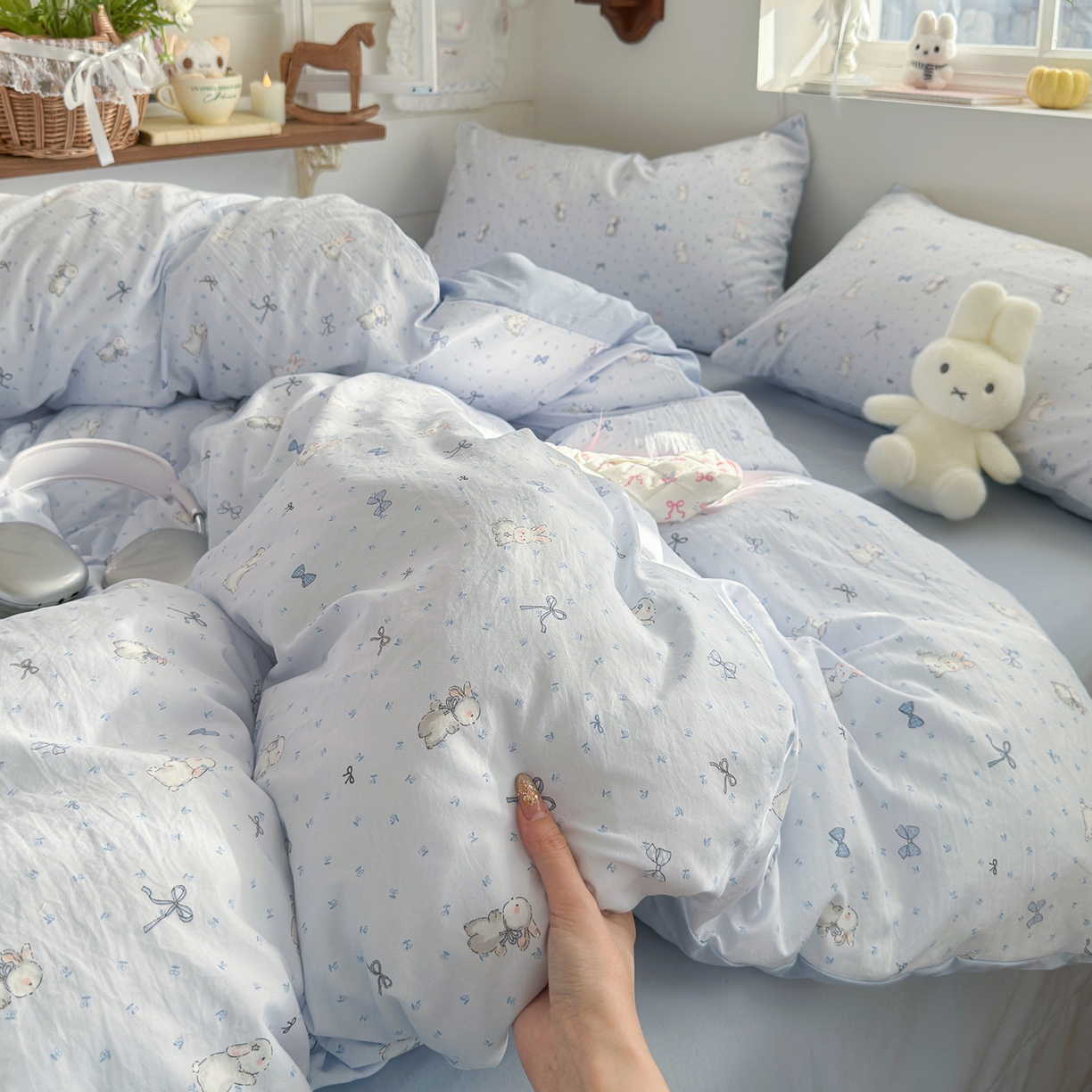 91家纺网 家纺一手货源 找家纺 金梦拉家纺 2026新款春夏古法水洗仿棉砂洗云小棉小布袋四件套 蓝小兔