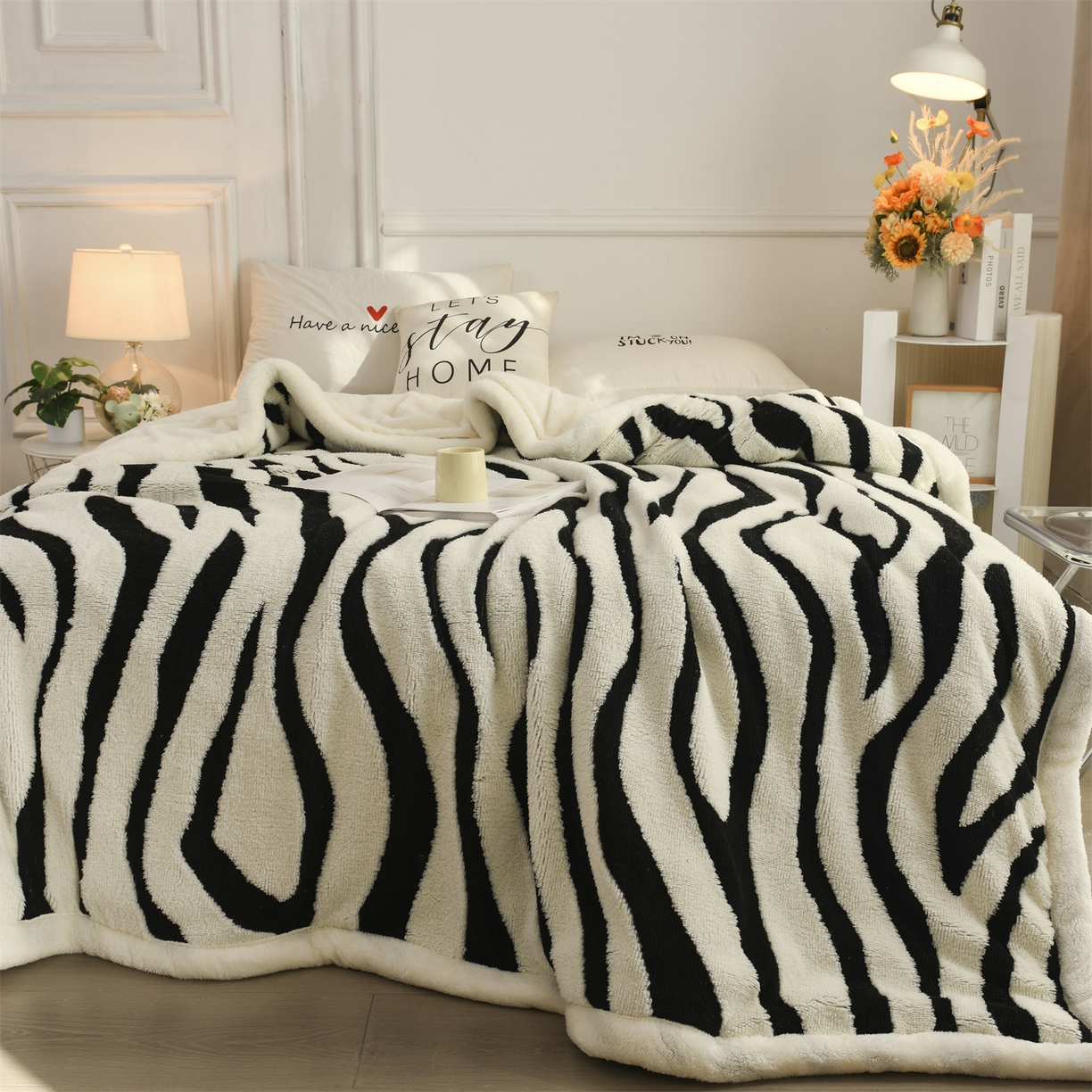 91家纺网 家纺一手货源 找家纺 恋绒家纺 2025新款阳离子三层舒棉绒毛毯毯子 斑马纹
