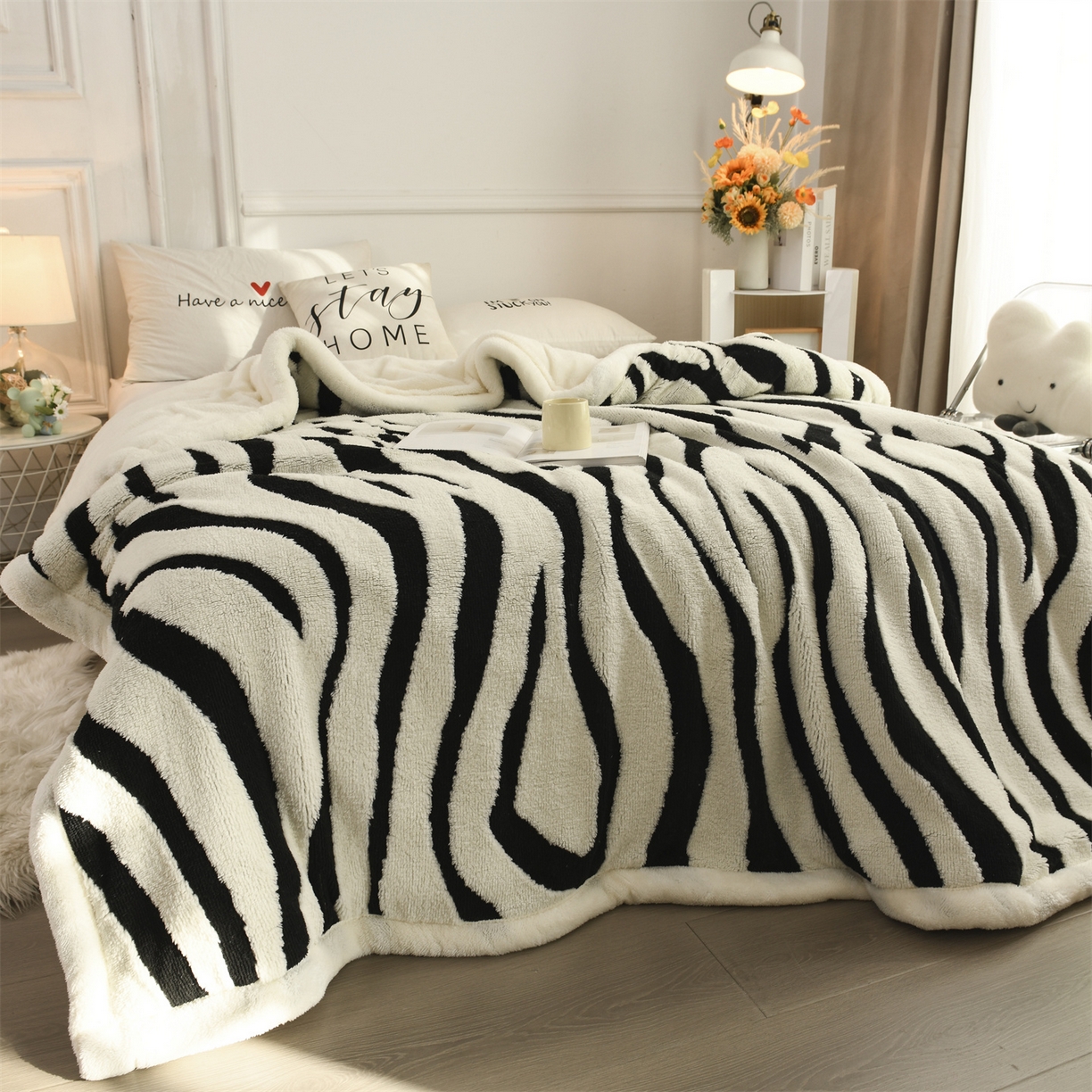 91家纺网 家纺一手货源 找家纺 恋绒家纺 2025新款阳离子三层舒棉绒毛毯毯子 斑马纹
