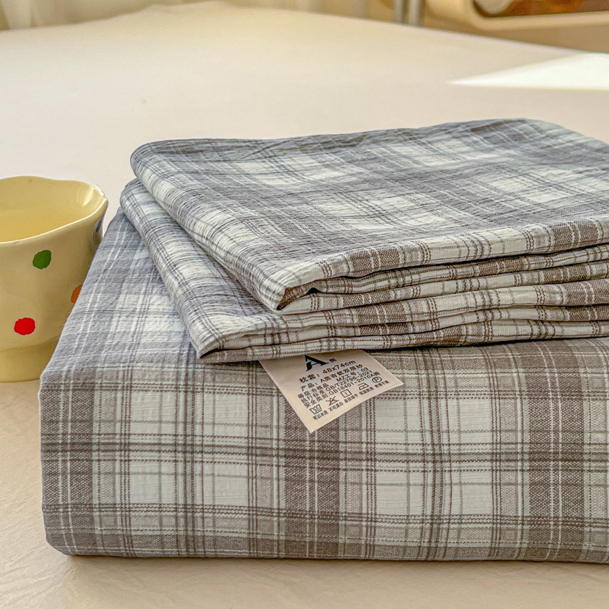 91家纺网 家纺一手货源 找家纺 思诺羽床笠 2026新款云感双层纱床单系列 灰格调