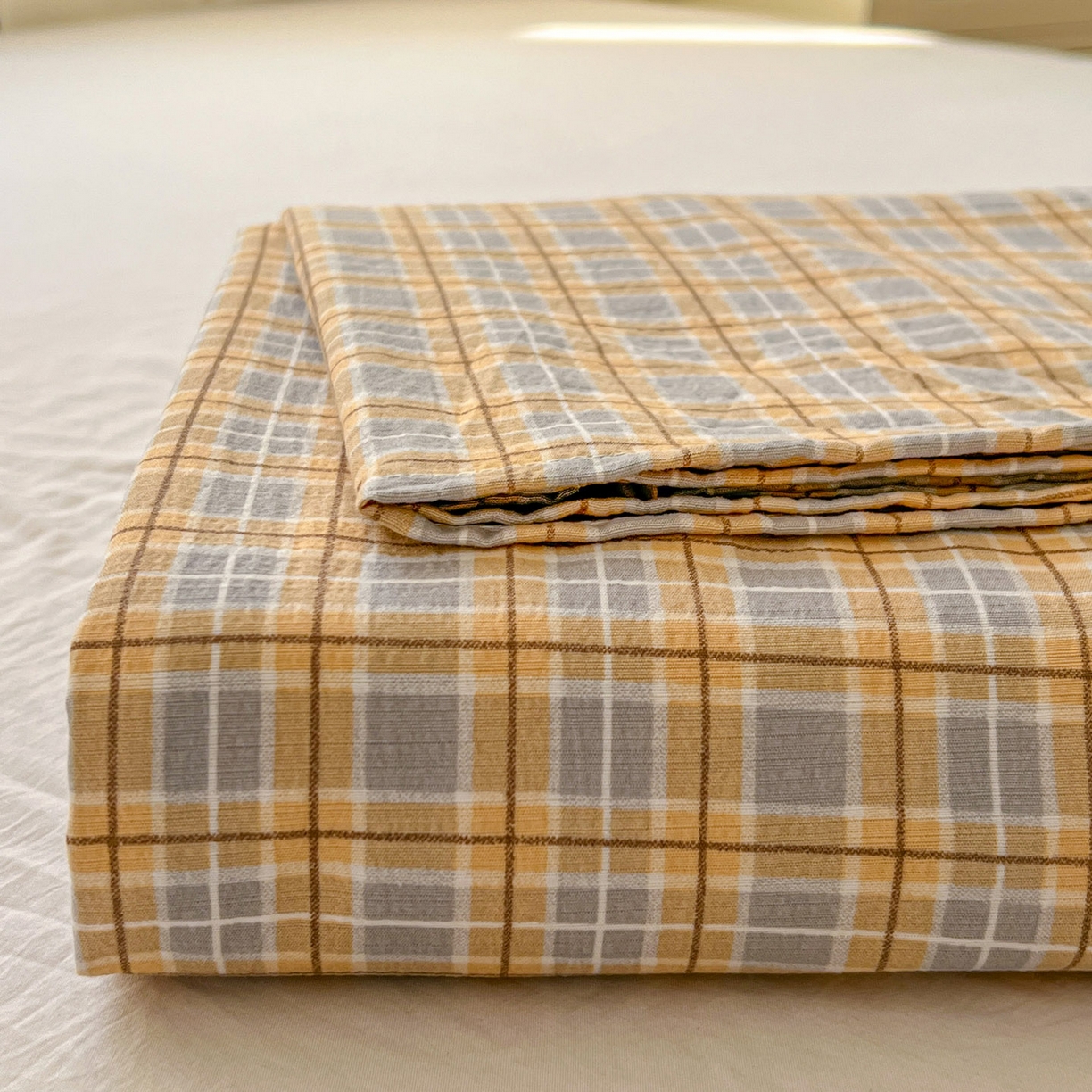 91家纺网 家纺一手货源 找家纺 思诺羽床笠 2026新款云感双层纱床单系列 简约格