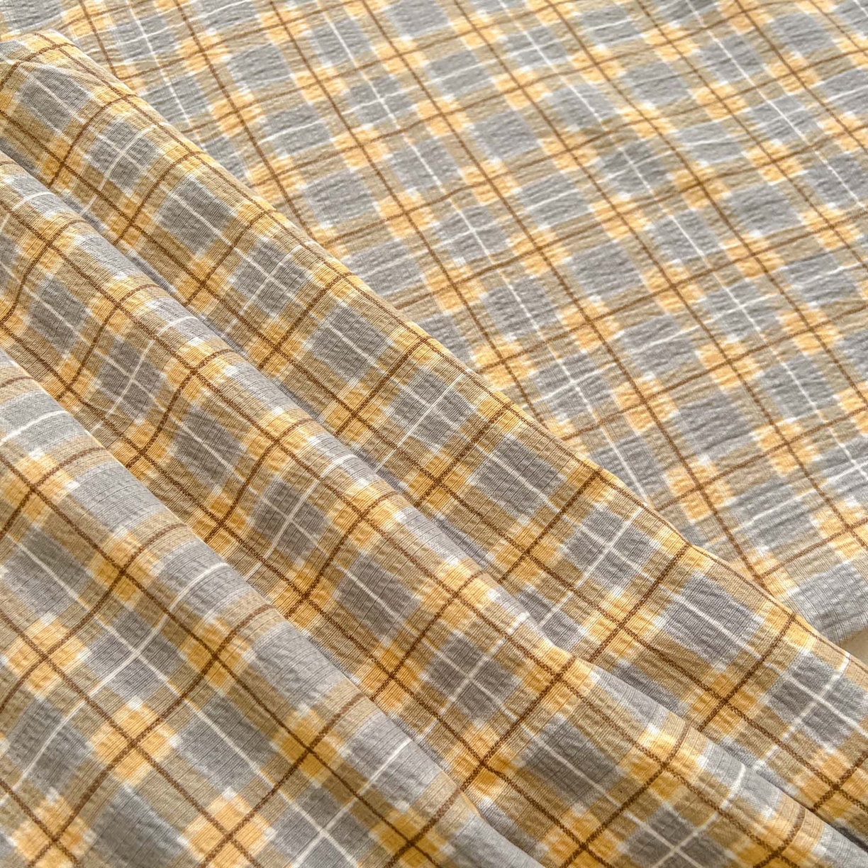 91家纺网 家纺一手货源 找家纺 思诺羽床笠 2026新款云感双层纱床单系列 简约格