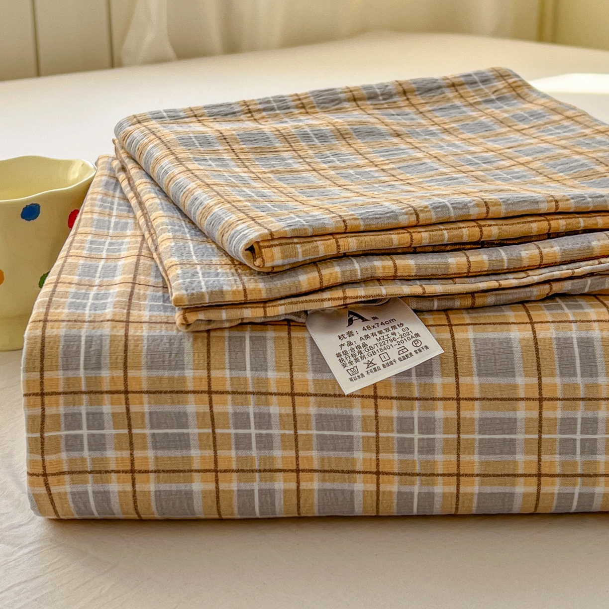 91家纺网 家纺一手货源 找家纺 思诺羽床笠 2026新款云感双层纱床单系列 简约格