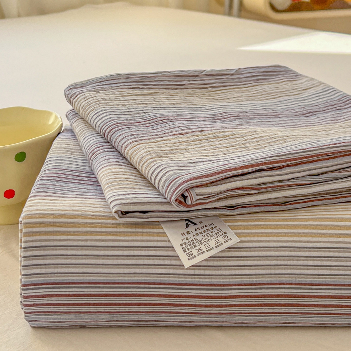 91家纺网 家纺一手货源 找家纺 思诺羽床笠 2026新款云感双层纱床单系列 流年-咖