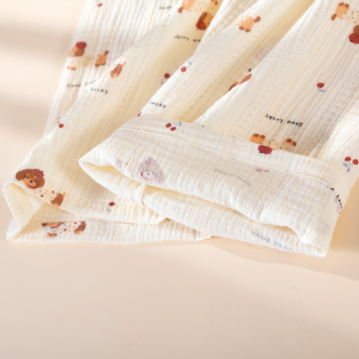 91家纺网 家纺一手货源 找家纺 洛兰沙家居馆 2025新款双层绉纱棉纱卡通系列女士家居服睡衣长袖长裤透气舒适四季款纯棉 樱桃腊肠狗