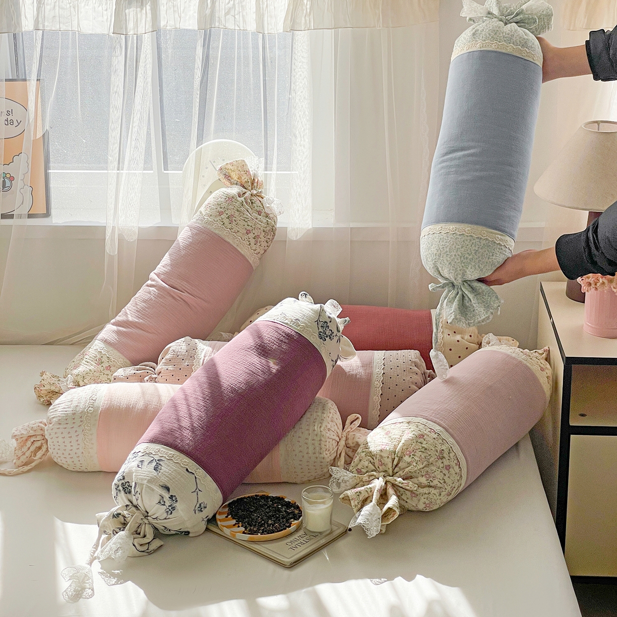 91家纺网 家纺一手货源 找家纺 （总）亦帆枕芯 2025新款多功能枕糖果形荞麦颈椎抱枕透气新生儿侧睡枕枕头枕芯