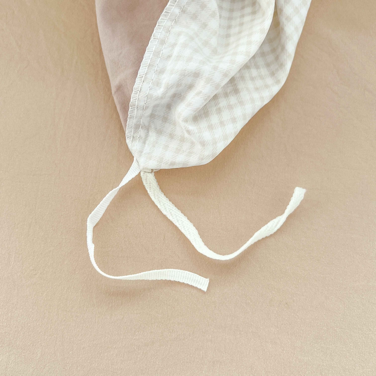 91家纺网 家纺一手货源 找家纺 格真 2026新款韩国小布袋A类古法水洗仿棉云感纱四件套 格纹小熊