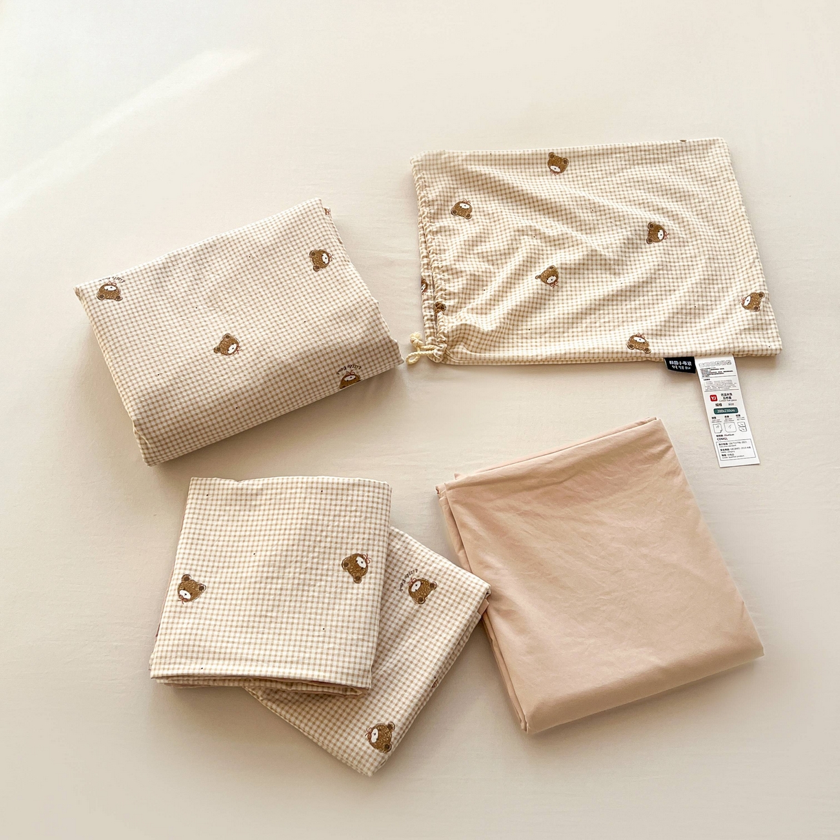 91家纺网 家纺一手货源 找家纺 格真 2026新款韩国小布袋A类古法水洗仿棉云感纱四件套 格纹小熊