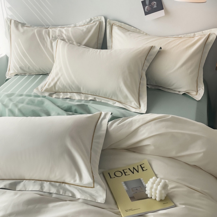 91家纺网 家纺一手货源 找家纺 锦彩家居 2026新款40支正宗13372双拼纯色全棉四件套酒店宾馆民宿学生三件套（可定制）标准号的床单是圆角吊边；小号和加大的床单都是直角 奶昔白-豆绿