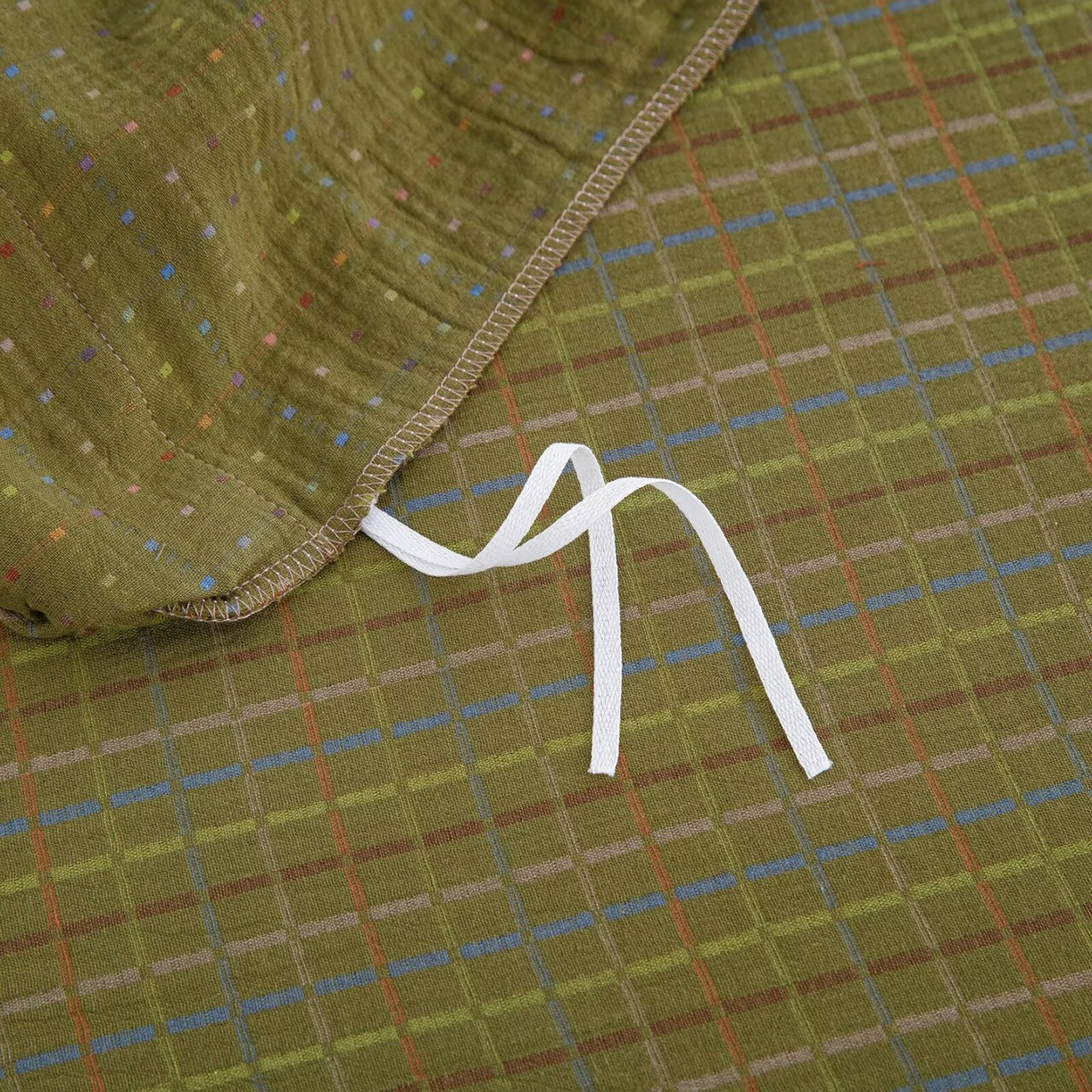 91家纺网 家纺一手货源 找家纺 仰望棉麻双层纱供应链 2025新款全棉色织提花双层纱四件套-彩虹格 彩虹格-绿纽扣款