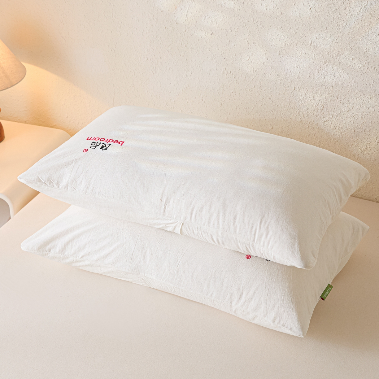 91家纺网 家纺一手货源 找家纺 芬晴家纺 2026新款条纹纯色良品刺绣枕套 纯色-白