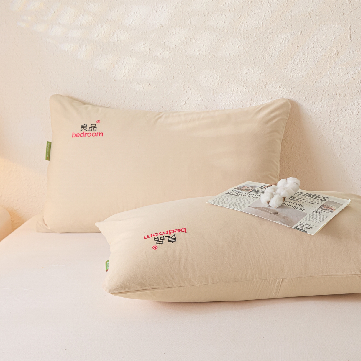 91家纺网 家纺一手货源 找家纺 芬晴家纺 2026新款条纹纯色良品刺绣枕套 纯色-浅卡